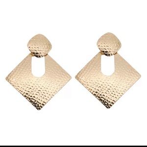 Gold dangling earrings